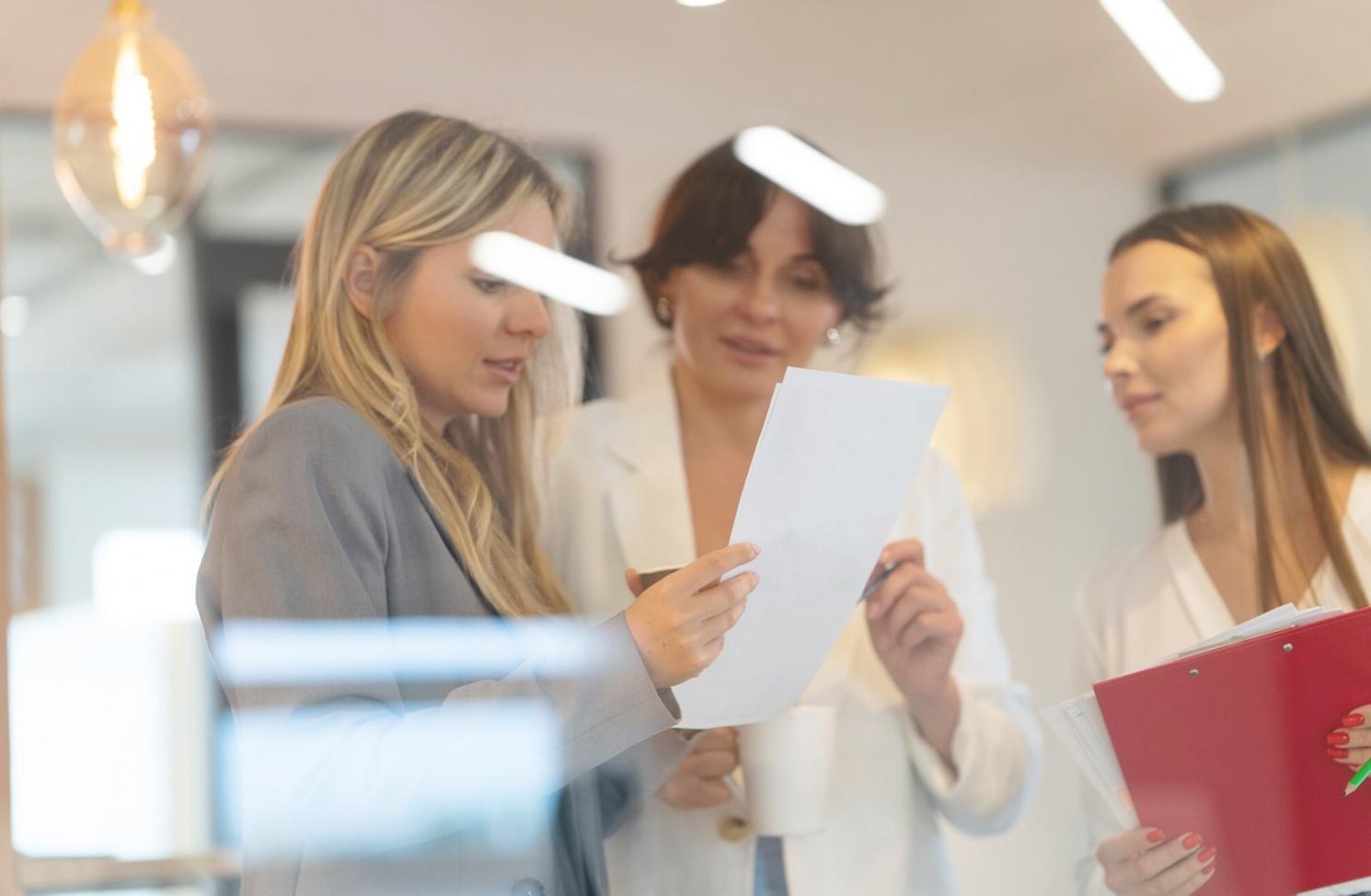 Person reviewing financial documents and recovery plans